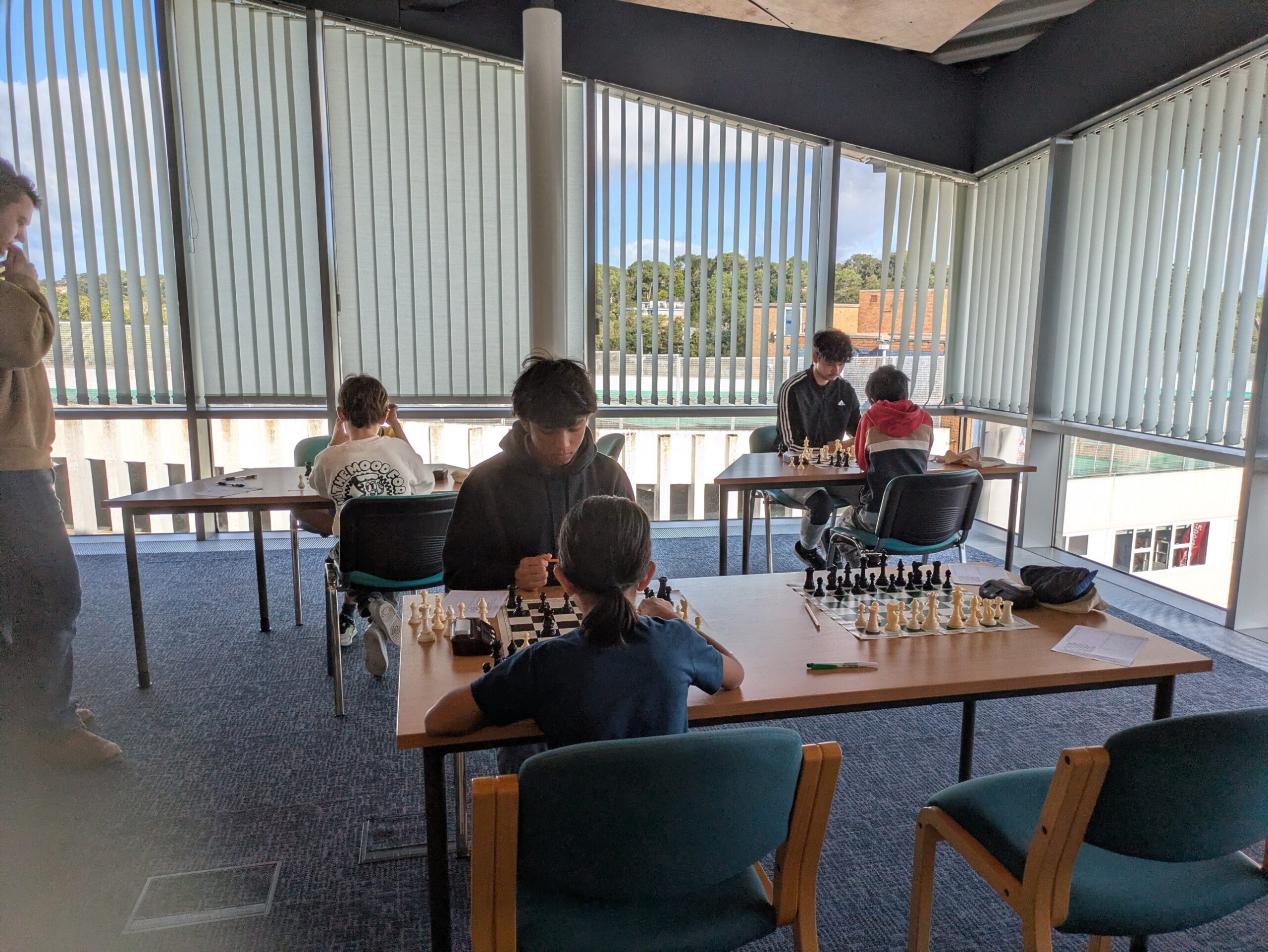 Players deep in concentration at the chess boards
