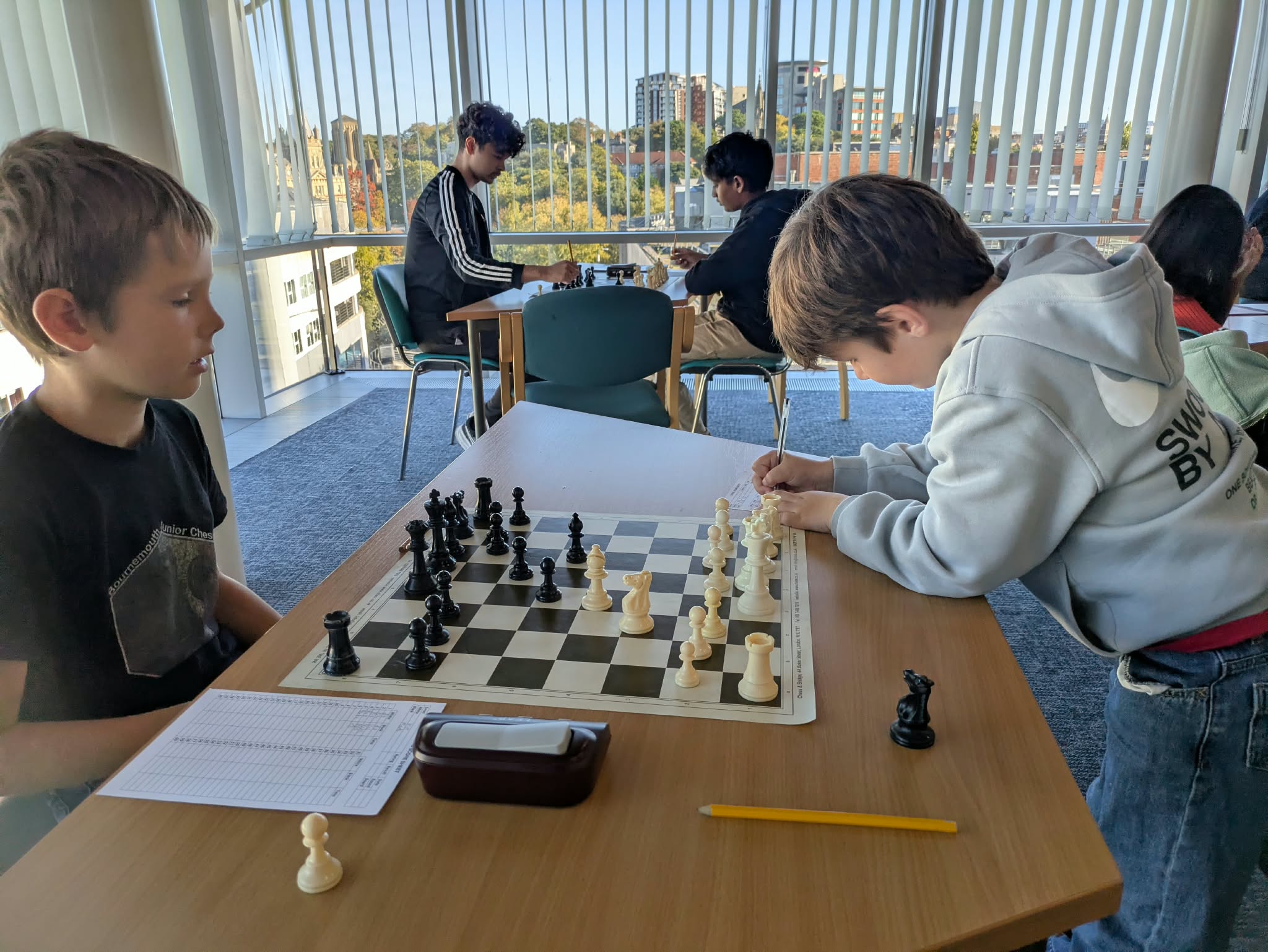Young players notating their game