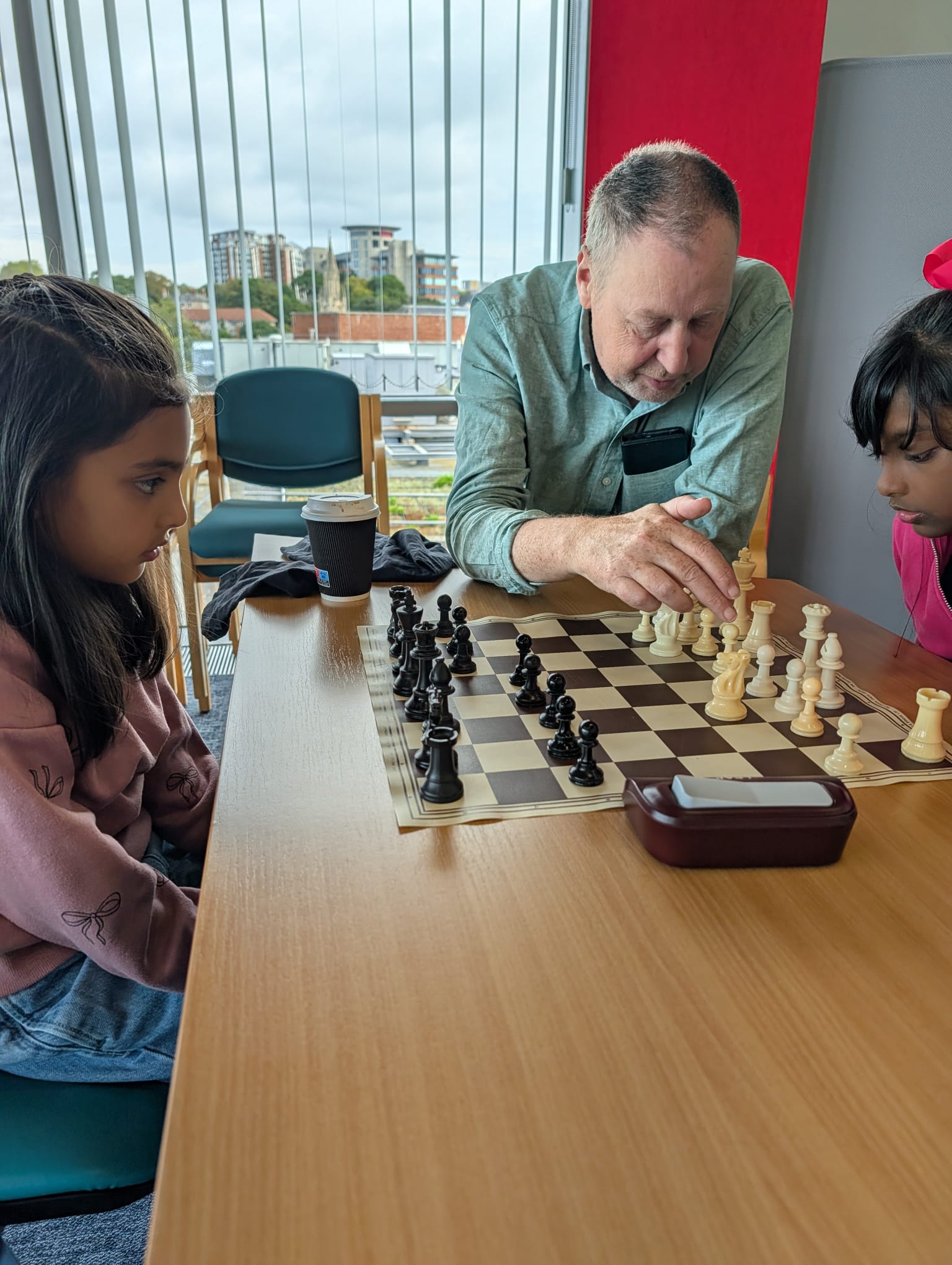 Coaching beginners at the board